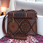 Light brown faux leather multicolor printed jute sling bag for women, durable crossbody style with 4 compartments, eco-friendly and handcrafted, perfect for casual or party occasions